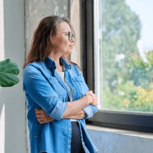 person looking reflective soft light minimal aging gracefully